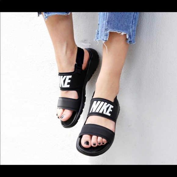 nike sandals on feet